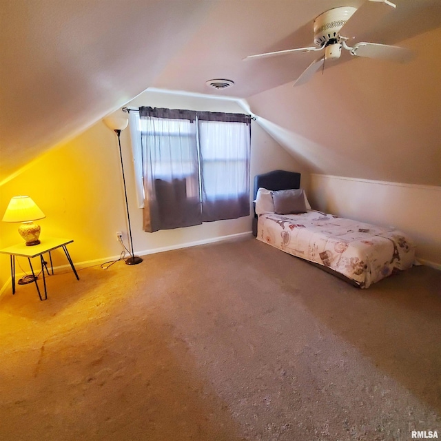 bedroom with lofted ceiling, carpet floors, and ceiling fan