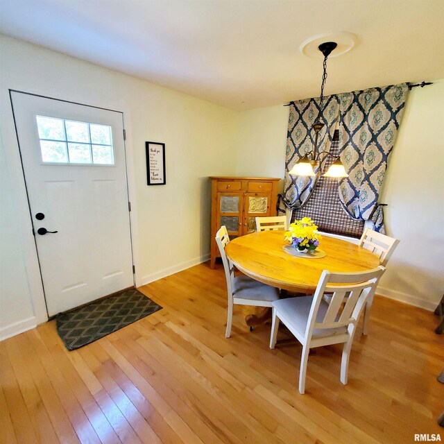 dining room featuring light wood-type flooring