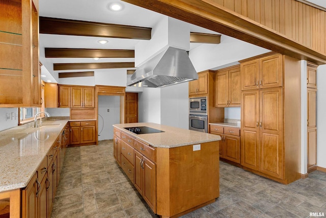 kitchen featuring light stone countertops, a kitchen island, island exhaust hood, and appliances with stainless steel finishes