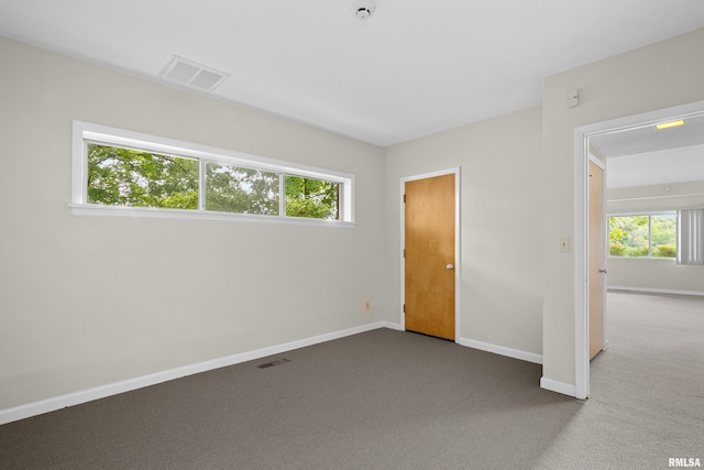 unfurnished bedroom featuring carpet flooring