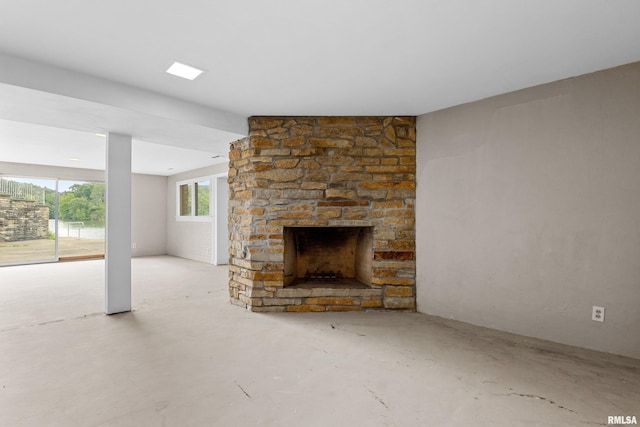 unfurnished living room with a fireplace