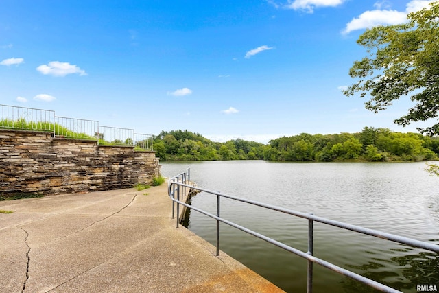 view of dock with a water view