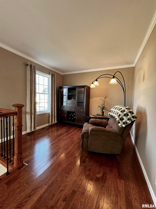 living room featuring crown molding and dark hardwood / wood-style floors