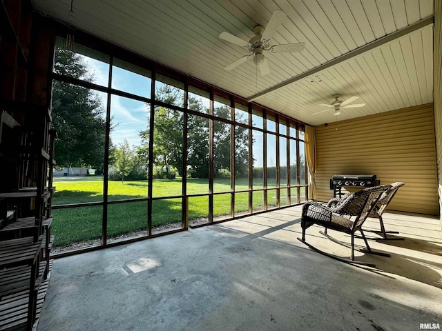 sunroom / solarium with ceiling fan and a wealth of natural light