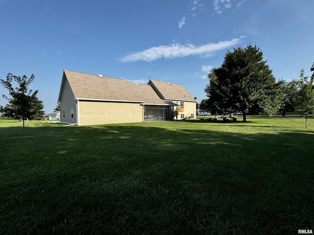 view of property exterior with a lawn