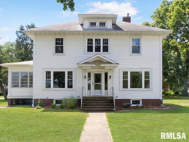 view of front of property featuring a front lawn