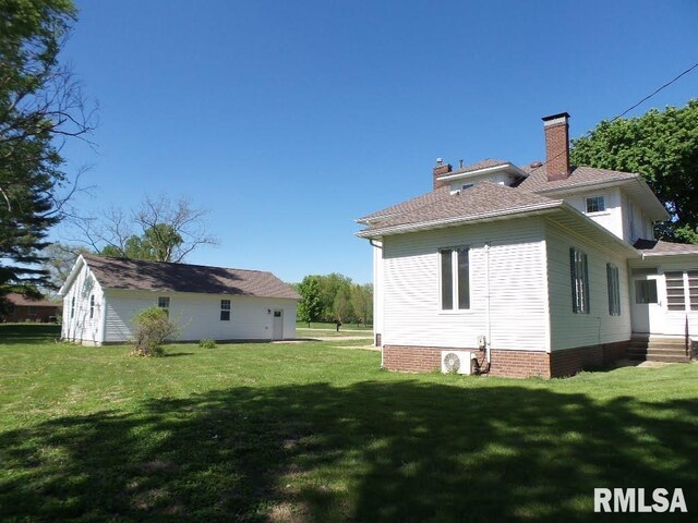 1201 Old Indiantown Rd, Henry, IL 61537 - view of front of house featuring a chimney and a front lawn