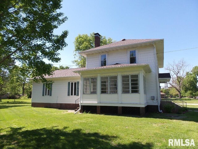 1201 Old Indiantown Rd, Henry, IL 61537 - view of property exterior featuring a shingled roof and a chimney