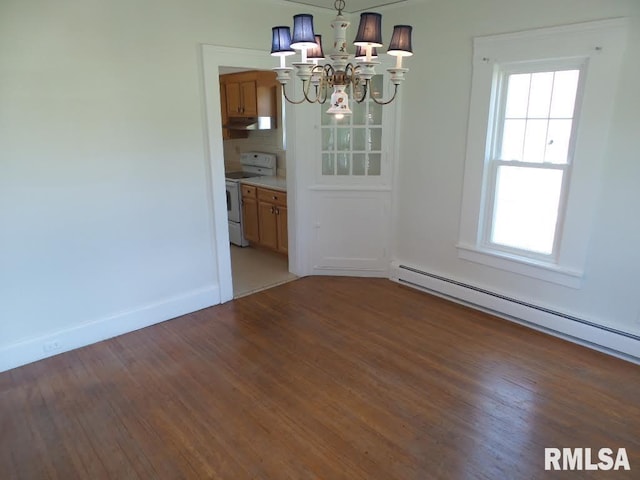 unfurnished dining area with an inviting chandelier, dark hardwood / wood-style flooring, and a baseboard radiator