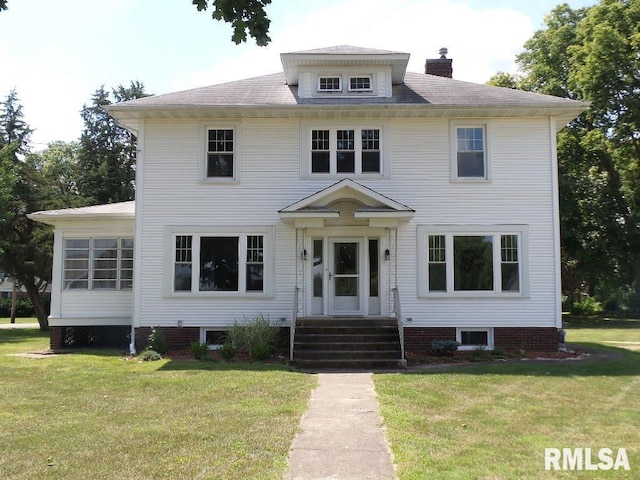 view of front of home with a front yard