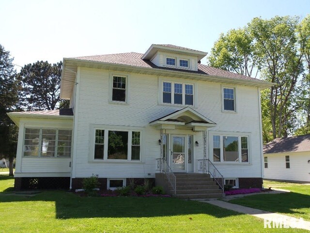 1201 Old Indiantown Rd, Henry, IL 61537 - back of house with a yard and a chimney
