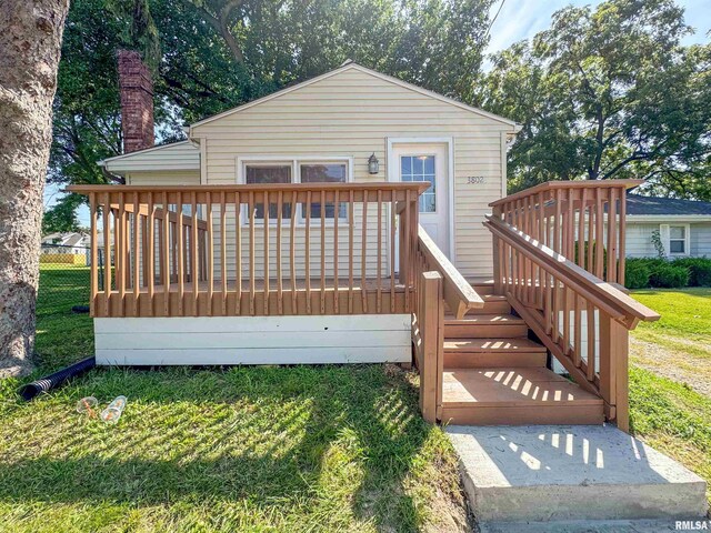 deck featuring a lawn