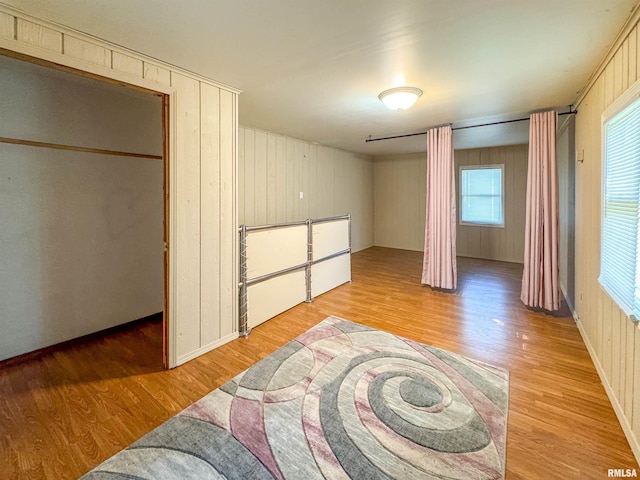 unfurnished bedroom featuring light wood-type flooring