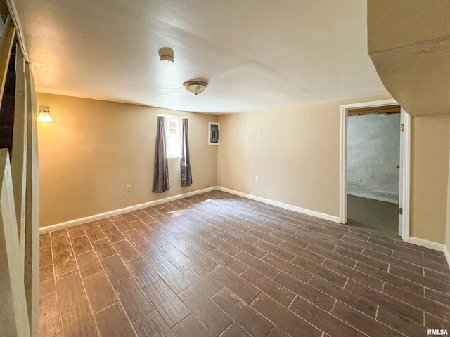 basement featuring wood-type flooring