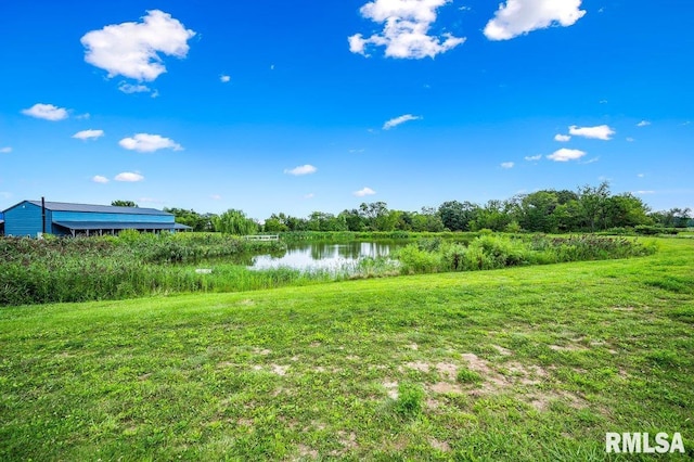 view of yard with a water view