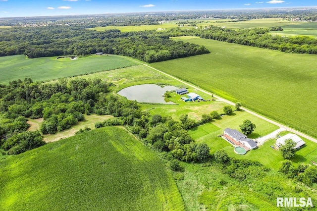 birds eye view of property with a water view and a rural view