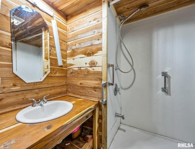 bathroom with vanity, walk in shower, and wooden ceiling