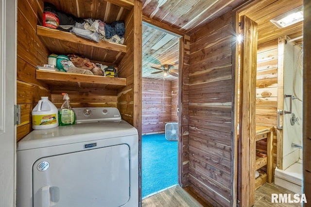 laundry room featuring light hardwood / wood-style flooring, wood walls, ceiling fan, and wooden ceiling