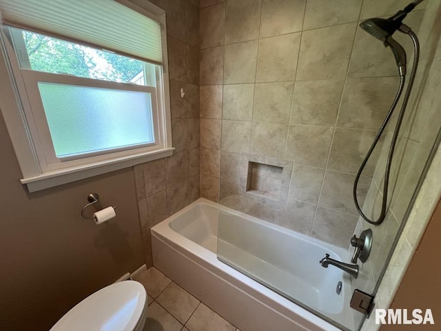 849 E Franklin St, Macomb, IL 61455 - bathroom featuring tile patterned floors, toilet, and bathing tub / shower combination