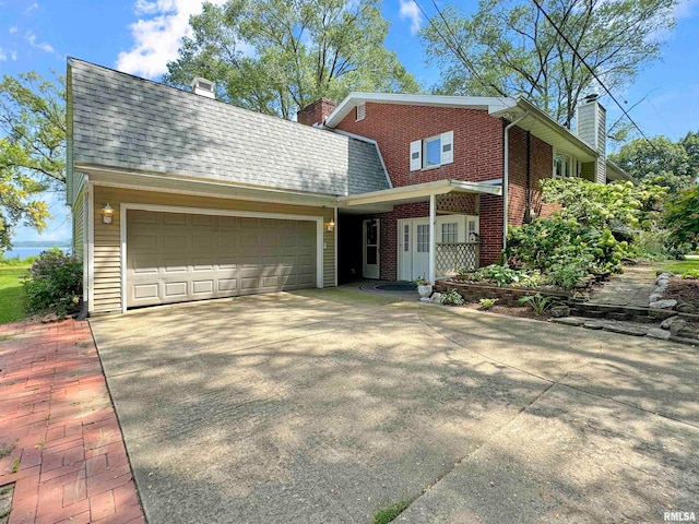 view of front of home with a garage