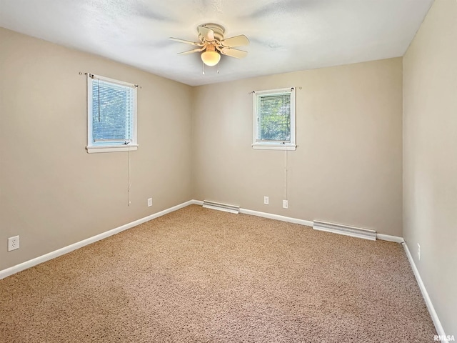 empty room with carpet flooring and ceiling fan