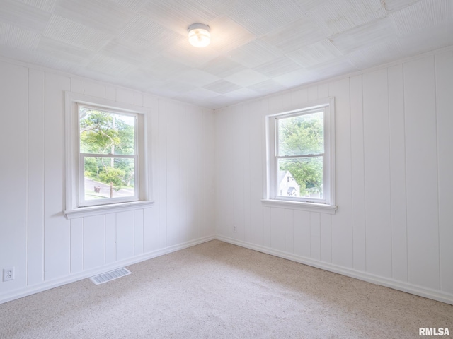 spare room with visible vents