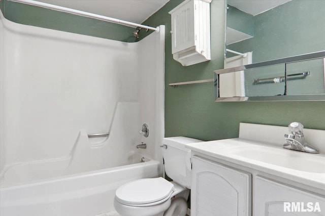 full bathroom featuring tub / shower combination, vanity, and toilet