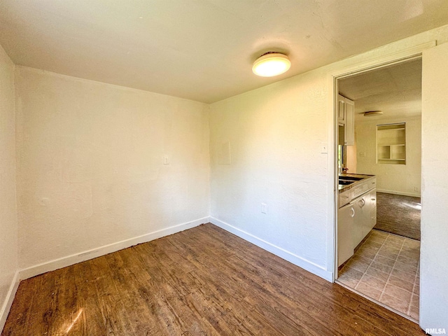 unfurnished room with light hardwood / wood-style floors