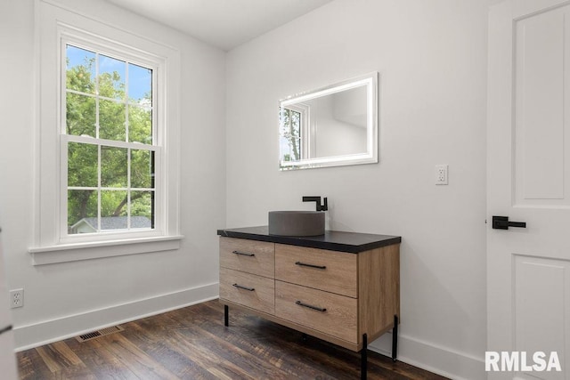 interior space with dark hardwood / wood-style floors