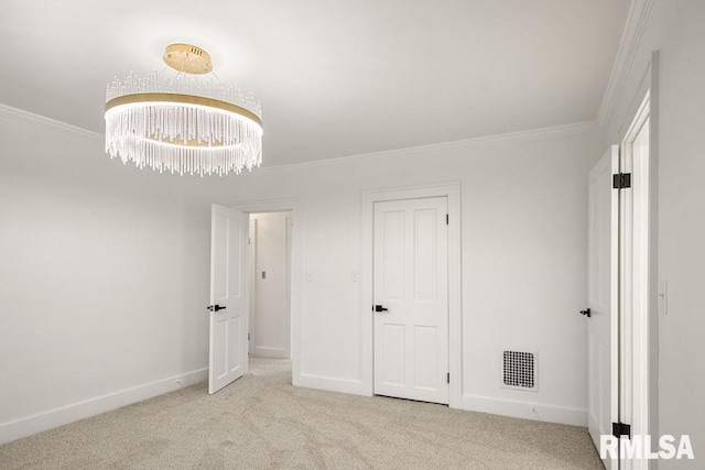 unfurnished bedroom featuring an inviting chandelier, ornamental molding, and light colored carpet