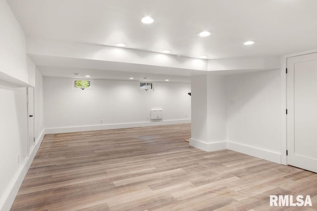 basement with light wood-type flooring