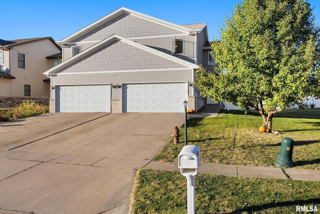 front facade with a front lawn and a garage