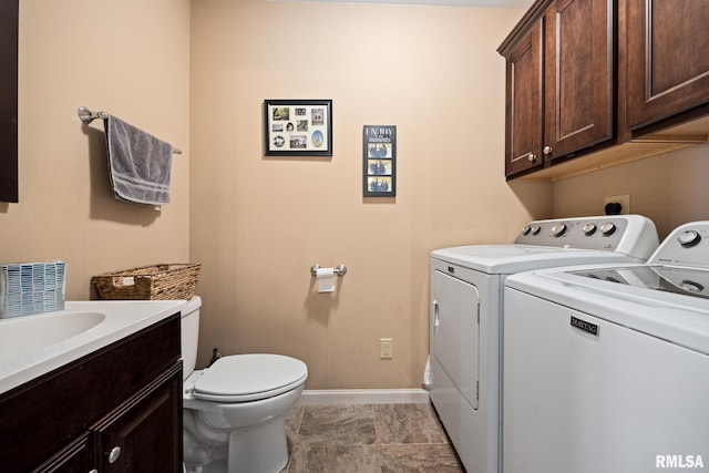 washroom featuring washer and clothes dryer