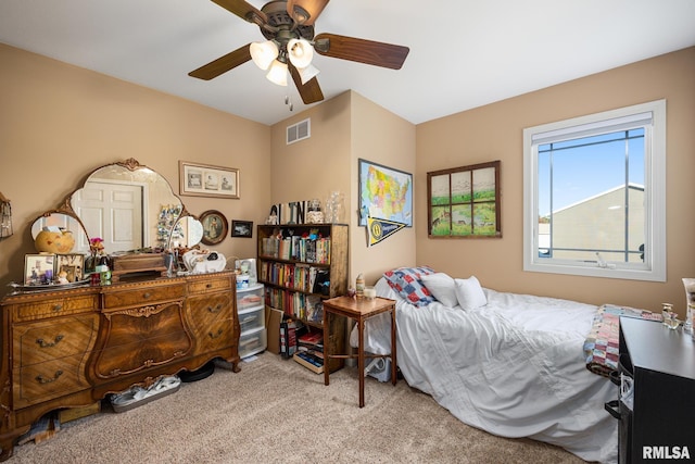 bedroom with light colored carpet and ceiling fan