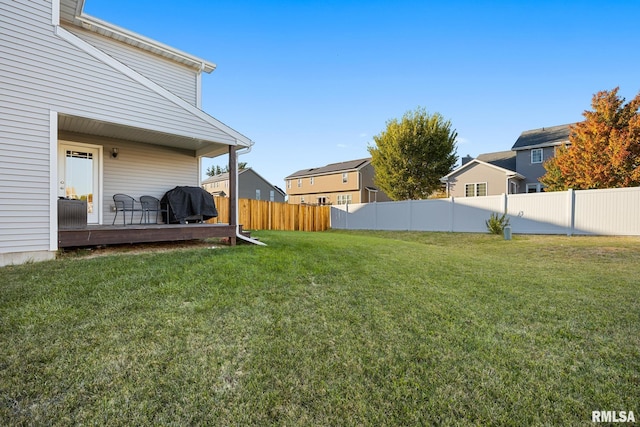 view of yard featuring a deck