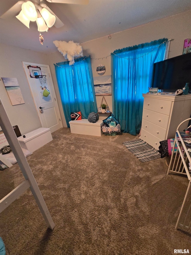 unfurnished bedroom featuring carpet flooring and ceiling fan