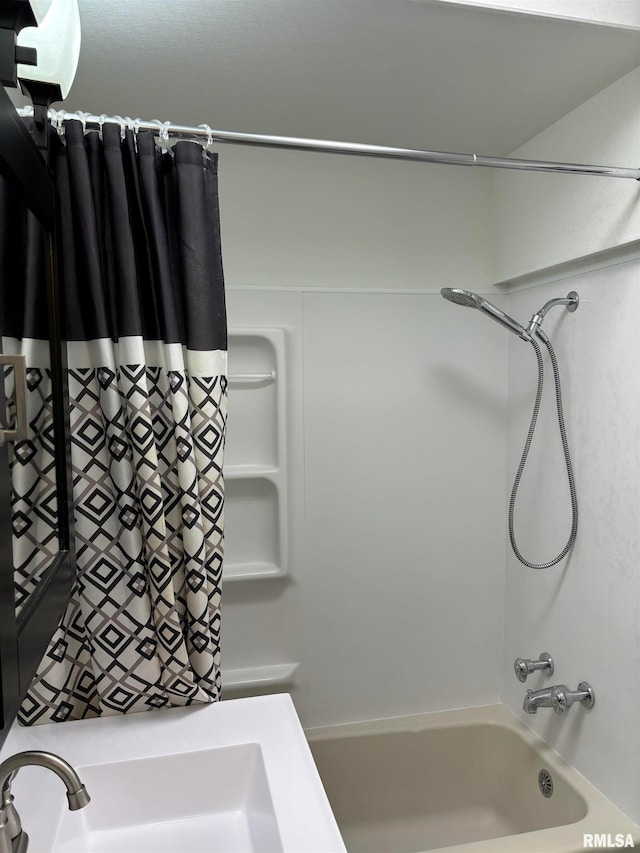 bathroom with shower / bathtub combination with curtain