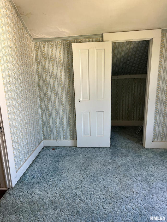 unfurnished bedroom featuring carpet