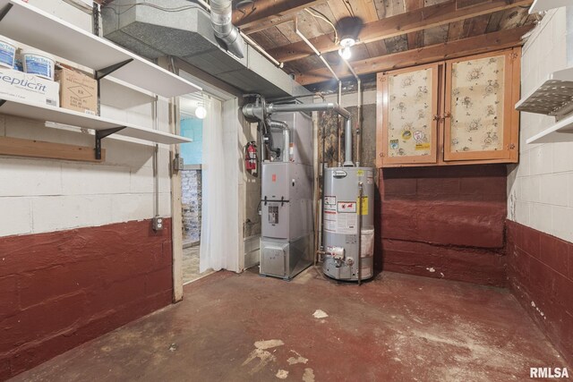 basement featuring heating unit and water heater