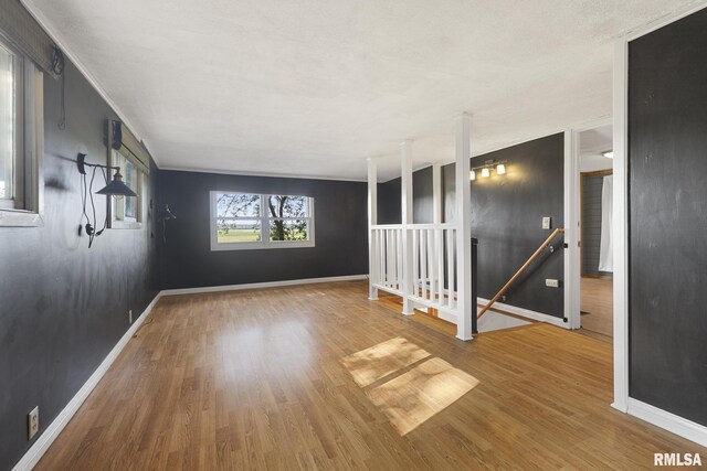 unfurnished room featuring wood-type flooring