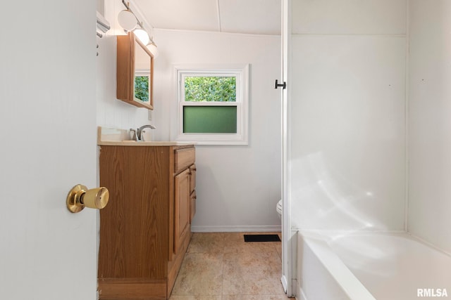 full bathroom featuring vanity, toilet, and separate shower and tub