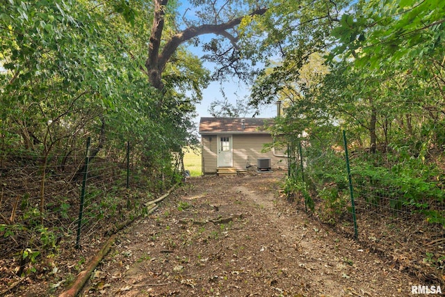 view of yard with central AC