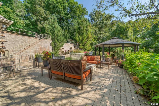 view of patio / terrace featuring a gazebo and an outdoor hangout area