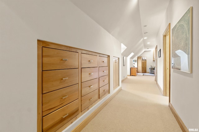 200 W Ravinwoods Rd, Peoria, IL 61615 - hall with light carpet, lofted ceiling, recessed lighting, and baseboards