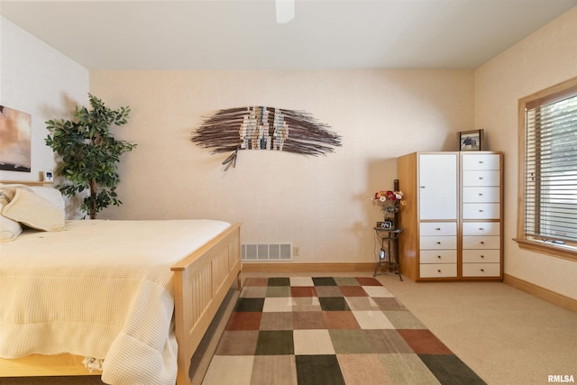 200 W Ravinwoods Rd, Peoria, IL 61615 - carpeted bedroom with baseboards