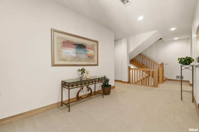 200 W Ravinwoods Rd, Peoria, IL 61615 - hallway featuring carpet, recessed lighting, baseboards, an upstairs landing, and stairs