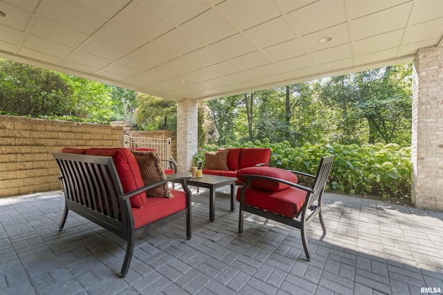 200 W Ravinwoods Rd, Peoria, IL 61615 - view of patio / terrace with outdoor lounge area and view of scattered trees