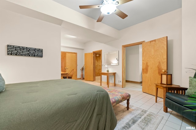 bedroom featuring ceiling fan and light tile patterned floors