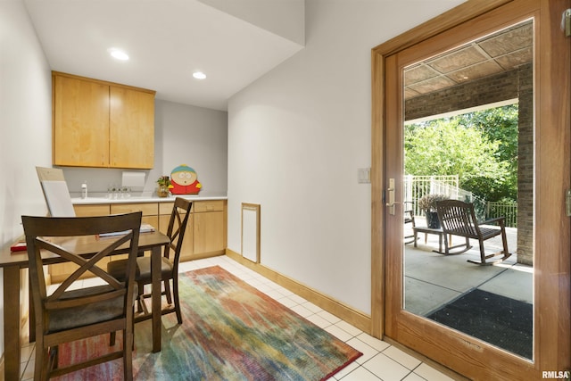 200 W Ravinwoods Rd, Peoria, IL 61615 - dining room with light tile patterned flooring, recessed lighting, and baseboards