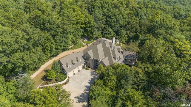 200 W Ravinwoods Rd, Peoria, IL 61615 - view of subject property with a heavily wooded area